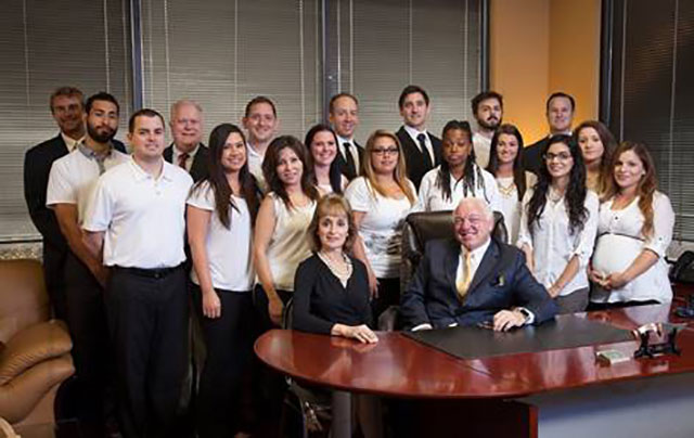 Single Point Carrier Services Team Standing In Conference Room
